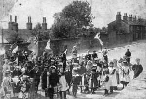 1901 Relief of Mafeking.  Children & villagers celebrate. Holcombe, on Lumb Carr Road, outside  school 
people
Keywords: 1945