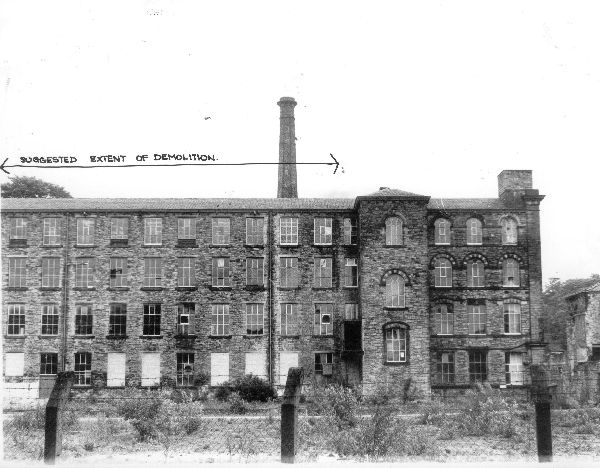 1970s. Joshua Hoyle Mill, from W. Extent of demolition suggested by marking with arrow. 
to be catalogued
Keywords: 1985