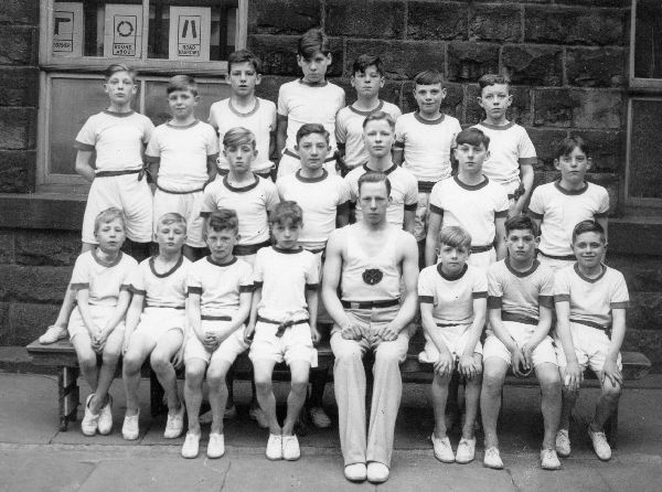 2 pics Holcombe Gymnastic Class, pre WW2. Founder Rev.... Scarlin, Vicar Holcombe. 1st instructor J. Blessington, then donor. Gave displays. Trained Holcombe School or Summ.st 
05-Education-01-Primary Schools-001-Emanuel Holcombe Church of England Primary School
Keywords: 0