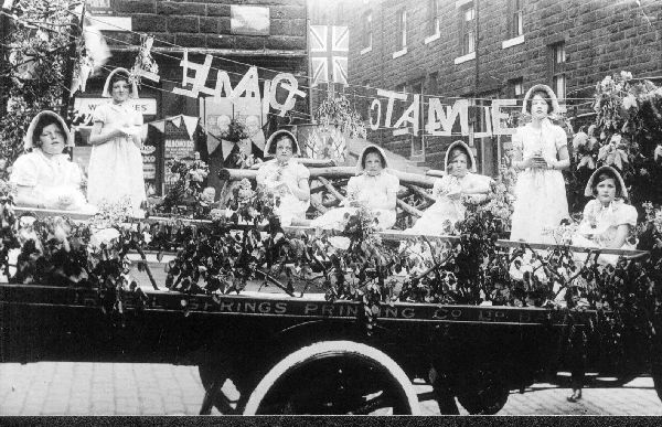 A float' Lilac Time1 in Rossendale carnival? Latel920s & 1930's. Title inspired by musical popular then or 1935 Silver Jubilee? Float owned by Irwell Springs Co. Bacup 
to be catalogued
Keywords: 1985