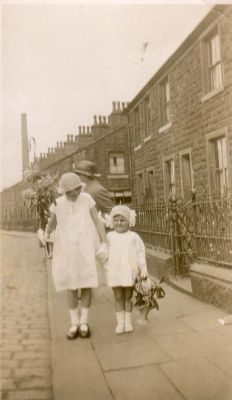 Edna Holden and friend dressed for 1931 St. Paul's Whit walks Edna Mary has traditional basket and older friend has crook. Also traditional dress for Whit walks. In Crow Lane
06-Religion-03-Churches Together-001-Whit Walks
Keywords: 1985