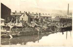 Stubbins 9th May 1941 from Chattertom lane after explosion of 1st landmine, early morning. Warwicks bungalow & wooden hut, (?) Pin meadow  (Scowcroft)
17-Buildings and the Urban Environment-05-Street Scenes-027-Stubbins Lane and Stubbins area
Keywords: 1945