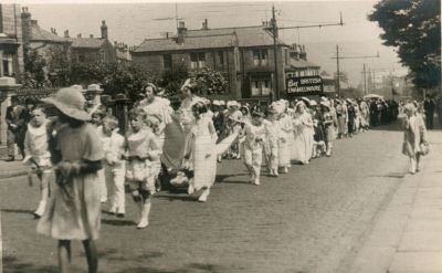 St Andrews Whit procession in Bolton Street approaching church - 1936Ref No
RHS/21/6/2/23 in Bury Archive
06-Religion-01-Church Buildings-002-Church of England  -  St. Andrew, Bolton Street, Ramsbottom
Keywords: 0