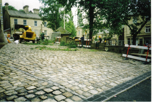 Trees being cut down in Market Place 
17-Buildings and the Urban Environment-05-Street Scenes-017-Market Place
Keywords: 1997