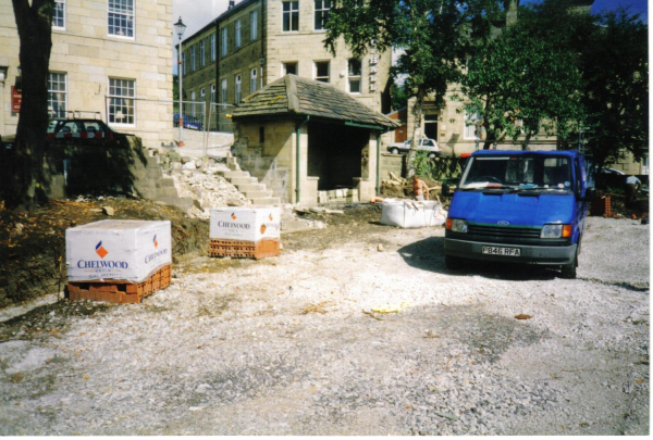The workmen move in to renovate Market Place 
17-Buildings and the Urban Environment-05-Street Scenes-017-Market Place
Keywords: 1997