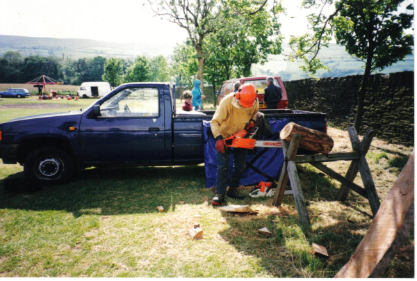 Richard Caink uses a chain saw to carve a log at Edenfield Fete
17-Buildings and the Urban Environment-05-Street Scenes-011-Edenfield
Keywords: 1997