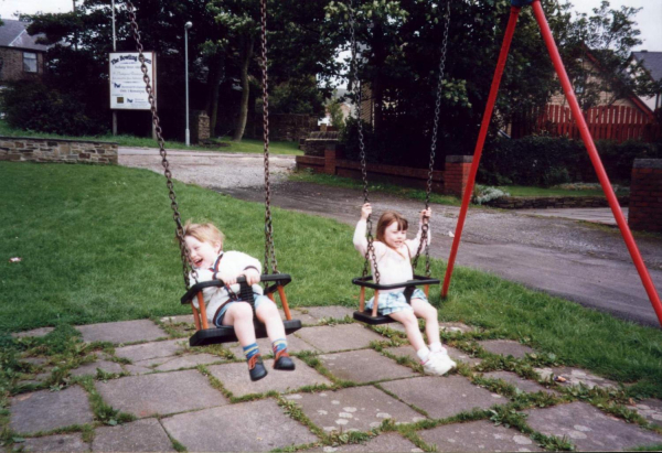 Children enjoy a swing on Edenfield's playground
17-Buildings and the Urban Environment-05-Street Scenes-011-Edenfield
Keywords: 1998