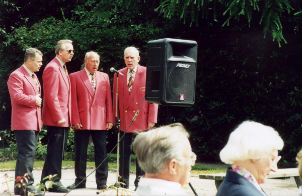 Urn Celebrations - Barber Shop Quartet 
17-Buildings and the Urban Environment-05-Street Scenes-017-Market Place
Keywords: 1998