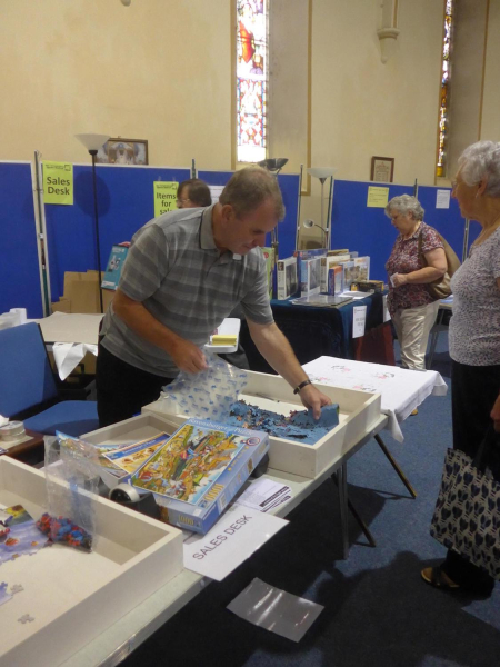 Jigsaw Festival at St Paul's 6 Sep 16 - Packing up a bought puzzle
06-Religion-01-Church Buildings-001-Church of England  - St. Paul, Bridge Street, Ramsbottom
Keywords: 2016