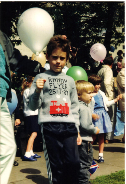 boy wearing first day of steam jumper 
14-Leisure-04-Events-007-Return of Steam 1987
Keywords: 1987
