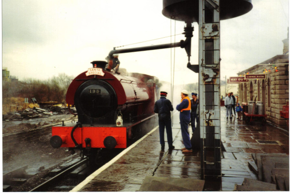 The Santa special being refilled with water 
16-Transport-03-Trains and Railways-000-General

Keywords: 1990