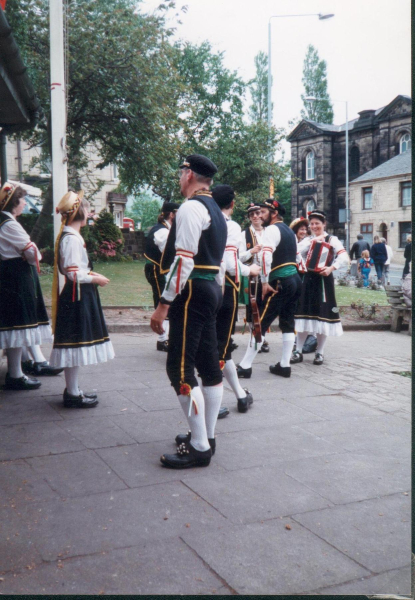 Morris Dancers in Market Place 
17-Buildings and the Urban Environment-05-Street Scenes-017-Market Place
Keywords: 1991