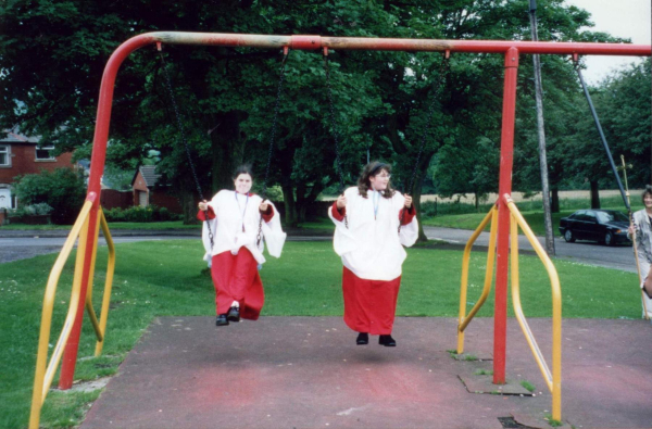 Choir girls enjoy a swing at the Rose Queen's procession 
06-Religion-03-Churches Together-002-Rose Queens
Keywords: 1998