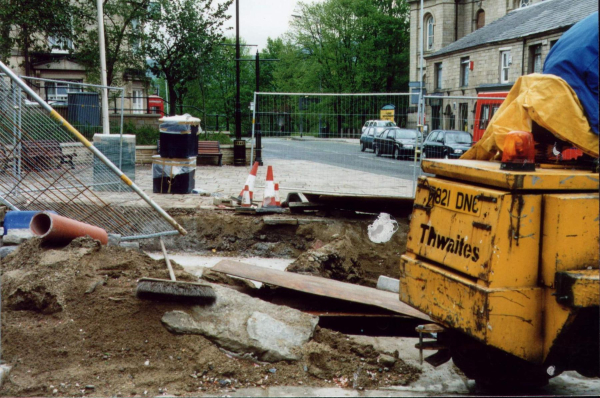 The hole seems to have been there for ever 
17-Buildings and the Urban Environment-05-Street Scenes-017-Market Place
Keywords: 1998