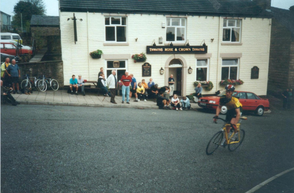 Drinkers cheer as cyclist passes Rose and Crown 
to be catalogued
Keywords: 2001