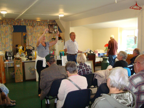 Paul Bradburn auctioning at the Charity Auction for Edenfield Parish Church at Edenfield Community Centre - 3rd September 2011
06-Religion-01-Church Buildings-004-Church of England -  Edenfield Parish Church
Keywords: 2011