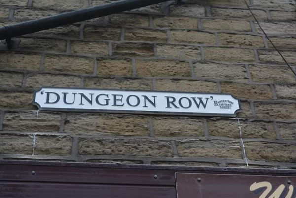 Dungeon Row Sign Bridge Street 
01-Ramsbottom Heritage Society-01-RHS Activities-014 Blue Plaques and Signs
Keywords: 2023