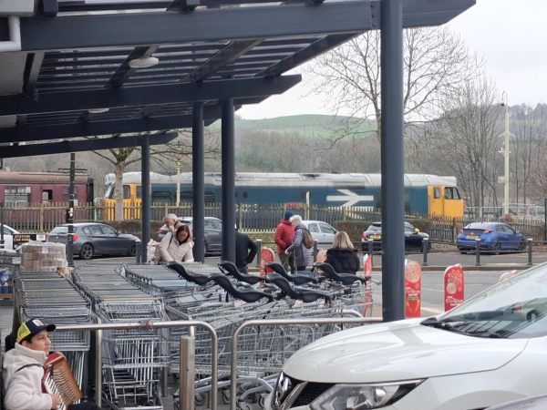 Busker at Aldi 
17-Buildings and the Urban Environment-05-Street Scenes-022-Railway Street
Keywords: 2025