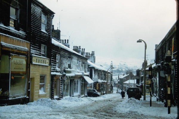 Looking down Bridge Street donated by Tony Tickle via Facebook. The photographer was John Geoffrey Duckworth who was Chief Engineer for Ramsbottom Urban District Council.  Photo taken on slide in the 1960s
17-Buildings and the Urban Environment-05-Street Scenes-003-Bridge Street
Keywords: 1969