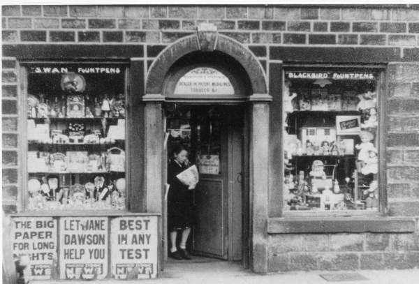 1958 Heys Newspaper shop, 53 Bolton St West Placards for Man. Evening Hews outside, but windows carry mixture of toys & giftware.
03 - Shops, Restaurants & Hotels - 02 - Individual shops
Keywords: Bury-Archive