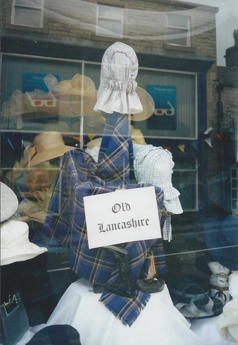 Shop window - Window decorated for Millenium Festival catalogued at Bury Archives as RHS/21/3/2/35 
03 - Shops, Restaurants & Hotels - 02 - Individual shops
Keywords: Bury-Archive