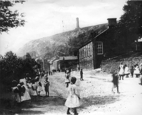 1906. Children playing in road outside Holcombe School 
05 - Education - 01 - Primary Schools
Keywords: Bury-Archive