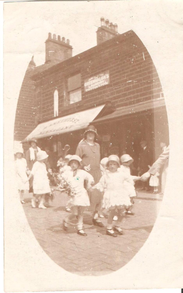 St Pauls Whit Walk southbound on Bridge Street c1930Passing Smethurst Newspaper, now Bridge Street News.
06 - Religion - 02 - Church Activities
Keywords: Bury-Archive