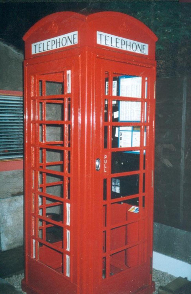 Telephone box from Ramsbottom old station (pulled down 1972 Bought 1994 from a Littleborough auction by Mr.Mason Denton(phone no. in file) who restored it, placed in garden 
07 - Government and Politics - 02 - Government and Public buildings
Keywords: Bury-Archive