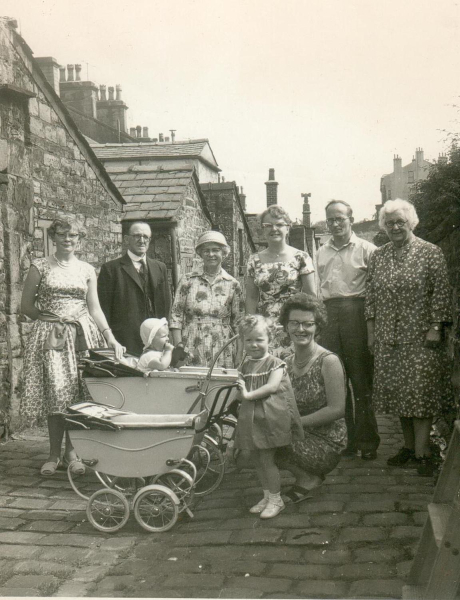 Hibbert family, 1961, back of Callender Street. Shows baby in pram, & matching dolls pram.
09 - People and Family - 01 - Families
Keywords: Bury-Archive