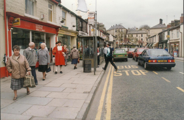 p51 4 6 pics Victorian Day, May Bank Holiday Ramabottom 1989. Town Crier, Ski Rossendale bus, shops in Bolton & Bridge Sts. [draper,Acorn Video,Dairy Box Cafe,Mr&Mrs Allpress 
12 - Customs and Traditions - 02 - Local Events
Keywords: Bury-Archive