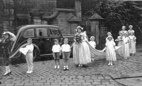 rose queen (Baptist, Rams c 1938 2 views Market Place rose queen is Agnes Entwistle R H S member 
12 - Customs and Traditions - 02 - Local Events
Keywords: Bury-Archive