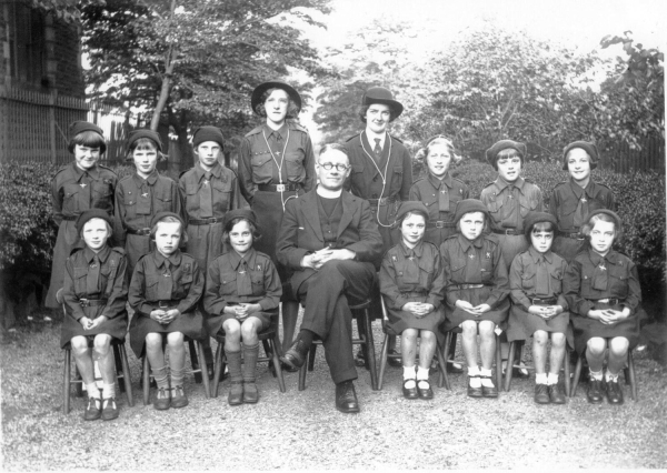 St.Andrews Anglican Brownies early 1930's with Canon Williamson and Beatrice Haslam . Mirror image.H.Lonsdale digitised 
14 - Leisure - 04 - Events
Keywords: Bury-Archive