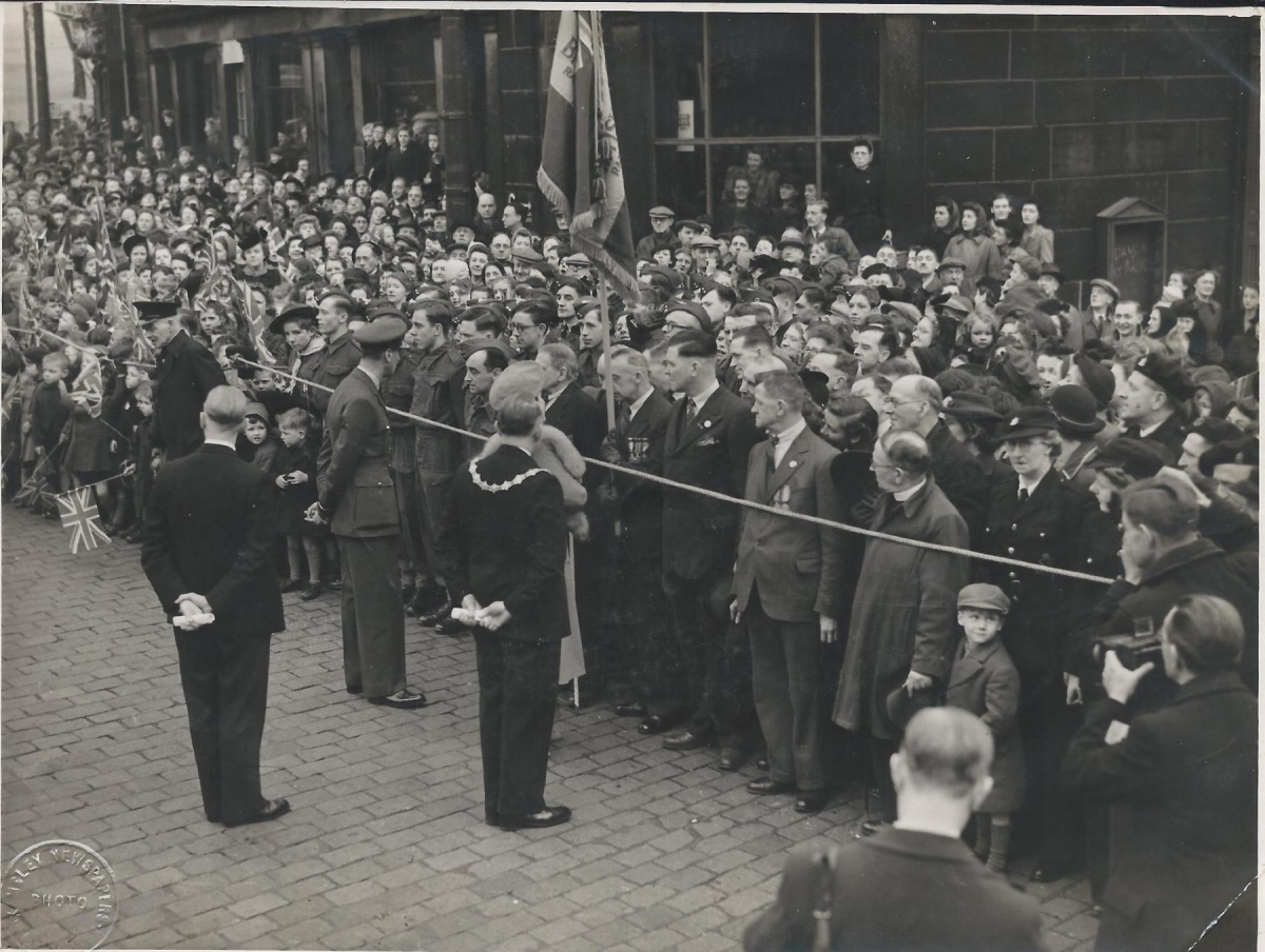 King George and Queen Elizabeth's visit to Ramsbottom 8th March 1945.  Scenes in the Market place - from an album of Mr. G. Holt, Chair of the Council. 
15 - War - 02 - World War 2
Keywords: Bury-Archive
