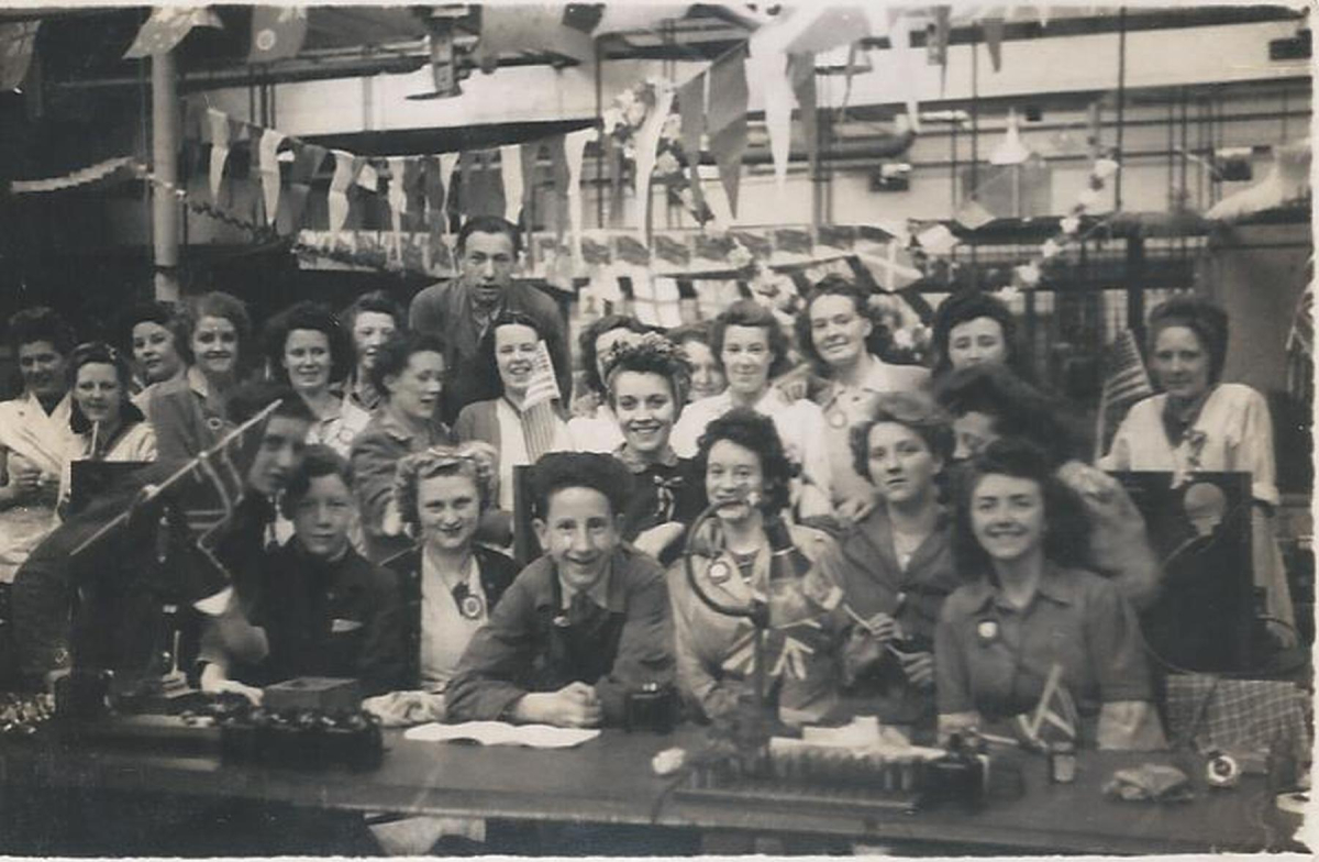 Workers at Ferranti Ltd, Victory in Europe celebrations - Note V.E. Day was 8th May- so firm were  celebrating in advance of the  public holiday. Site of Ferannti unknown ?Cairo Mill, Oldham or Hollinwood, Moston catalogued at Bury Archives as RHS/21/15/2
15 - War - 02 - World War 2
Keywords: Bury-Archive